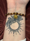 Bracelet mit Sonnen Charm