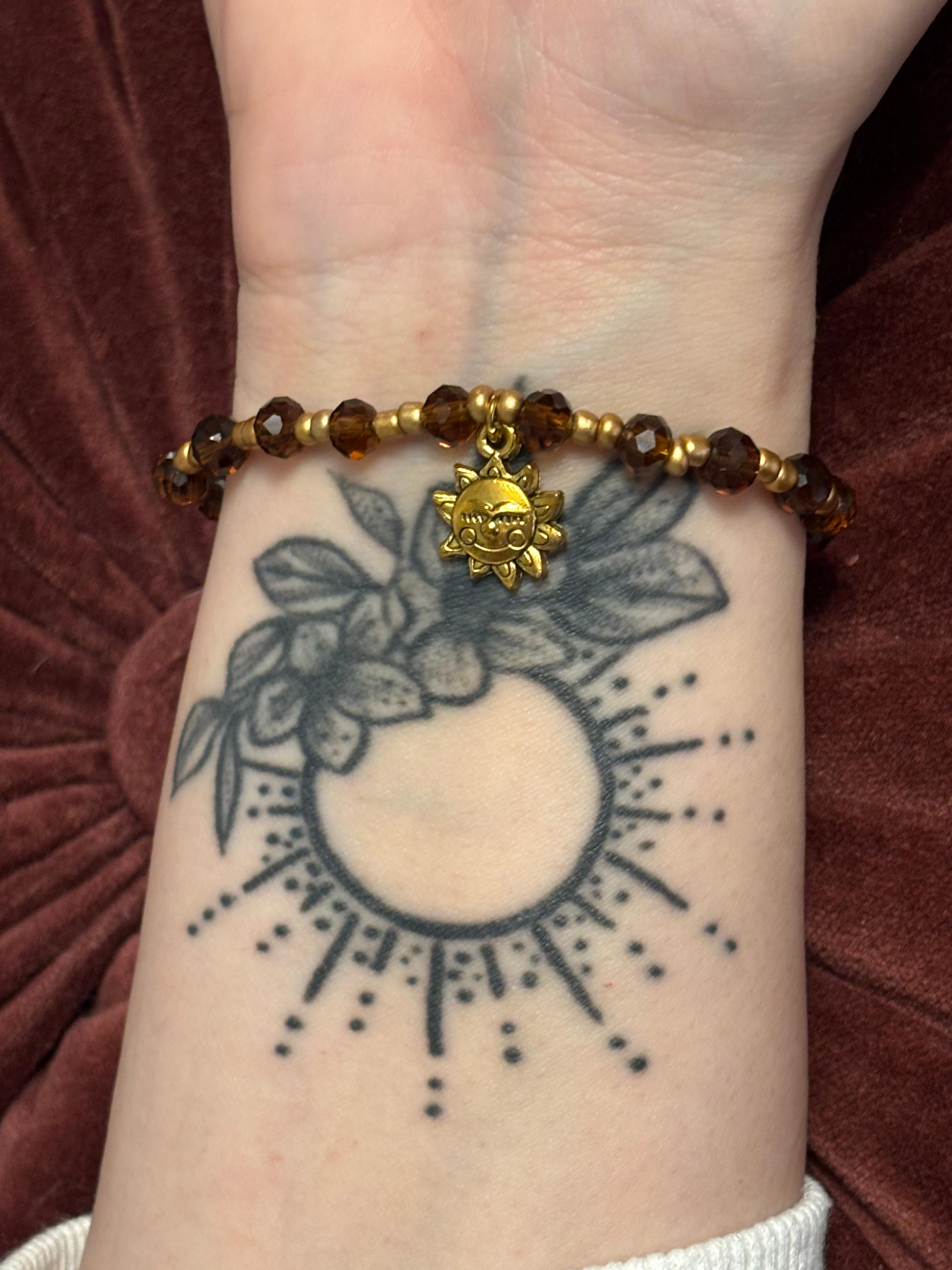 Bracelet mit Sonnen Charm