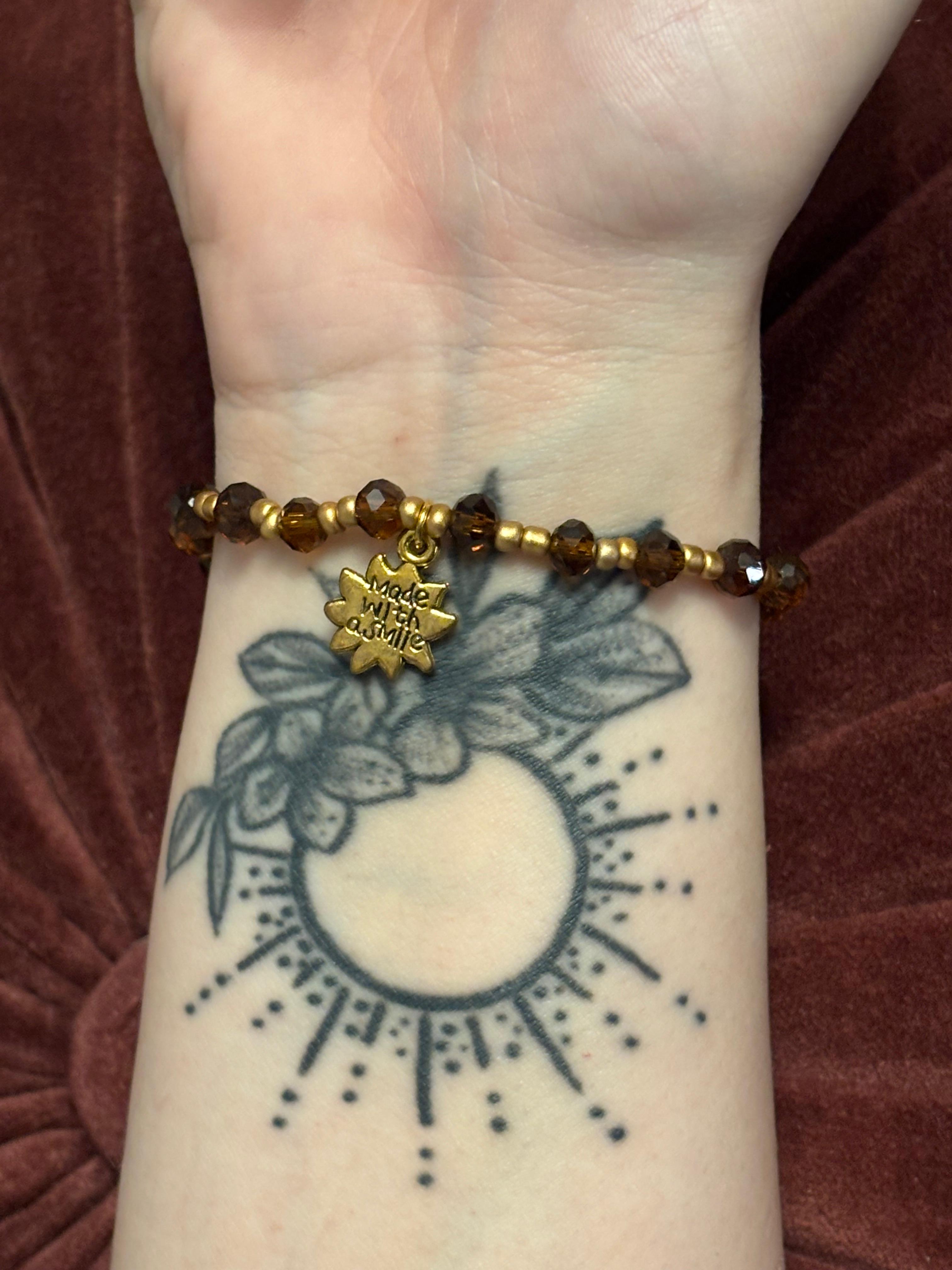 Bracelet mit Sonnen Charm